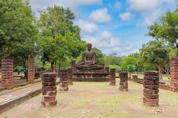 Sitting Buddha statue at Wat Singh temple in Kamphaeng Phet Historical Park, UNESCO World Heritage site