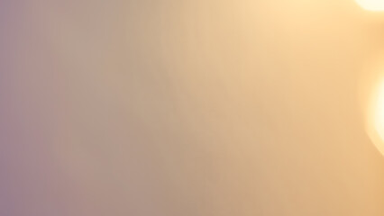 Bright golden bokeh lights create a vibrant and festive holiday background