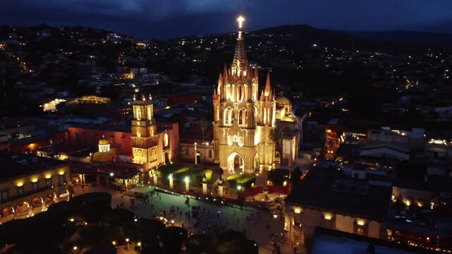 Night Aerial video of the Cathedral and old town of  San Miguel de Allende in Central Mexico