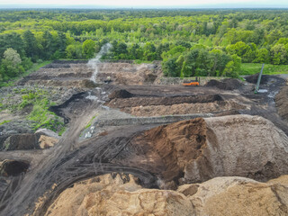 Large piles of mulch and compost; aerial view by drone; industry