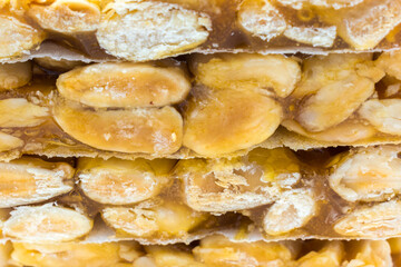 close-up image of turrón (nougat), a traditional Spanish Christmas sweet made with almonds.