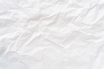 Top view and full frame of wrinkled or crumpled white stencil paper texture used for wrinkled or crumpled white paper background texture in decorative art work