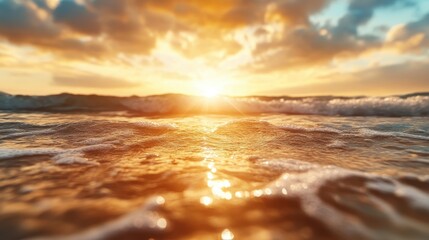 In this captivating image, golden sunlight dances over ocean waves, creating a stunning reflection that evokes feelings of peace and tranquility.