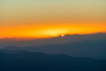 Beautiful bright sunrise in the mountains.