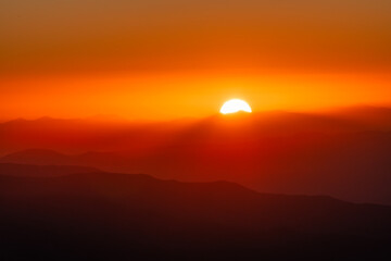 Beautiful bright sunrise in the mountains.