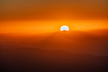 Beautiful bright sunrise in the mountains.