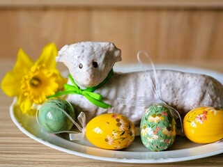 easter still life with eggs and chocolate lamb