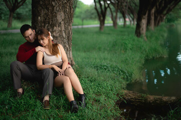 A Romantic Valentine's Proposal Under the Tree: A Couple Celebrating Their Anniversary with a Marriage Proposal