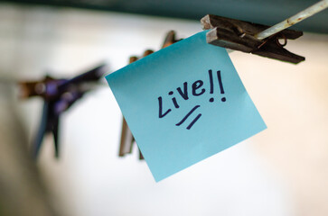 Motivational Word In A BlueSquare Paper Outdoor Composition
