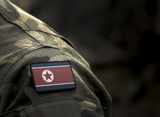 Flag of North Korea on military uniform (collage).