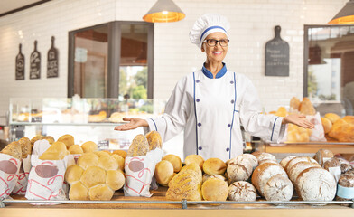 Female chef with freshly baked bread