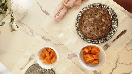 breakfast with pancakes and scrambled eggs