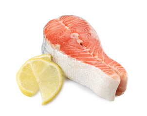 Fresh salmon steak and piece of lemon isolated on white