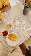 breakfast with pancakes and scrambled eggs