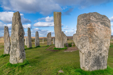 The ancient standing stones of Callanish (or Calanais) on Lewis in the Outer Hebrides of Scotland at sunset