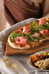 Italian Pizza with Arugula and Sliced Dried Turkey