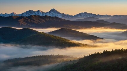 Obraz premium Misty mountain range at dawn 