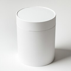 Minimalist white cylindrical cardboard box on white surface