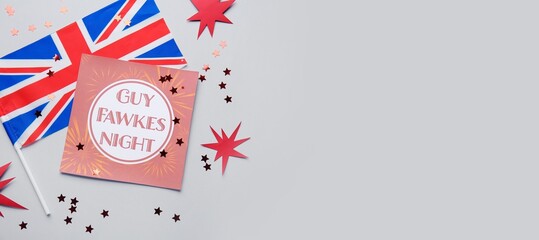 Greeting card for Guy Fawkes night and flag of Great Britain on grey background with space for text