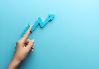 Hand Pointing Upward to a Rising Line Graph