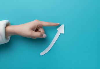 Hand Pointing Upward to a Rising Line Graph