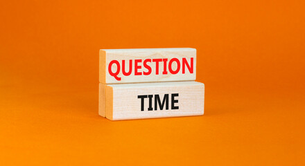 Question time symbol. Concept words Question time on beautiful wooden blocks. Beautiful orange background. Business and question time concept. Copy space.