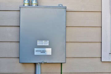 Standby generator transfer switch disconnect box junction wall residential.