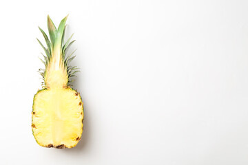Half of fresh pineapple on white background, top view. Space for text