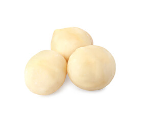 Whole peeled macadamia nuts isolated on white