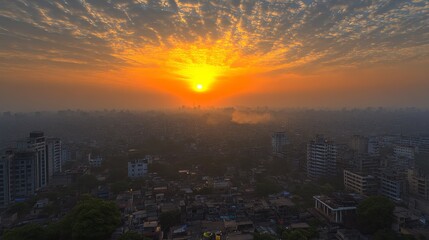Fototapeta premium Golden hues illuminate the city skyline showcasing the effects of air pollution at dusk