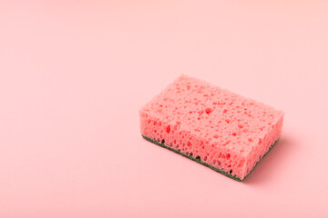 Colorful dish sponges on textured background. Kitchen sponge. Cleaning concept, cleaning service. Dishwashing liquid with clean and dirty dishes plate. Place for text, copy space. Wash the dishes.