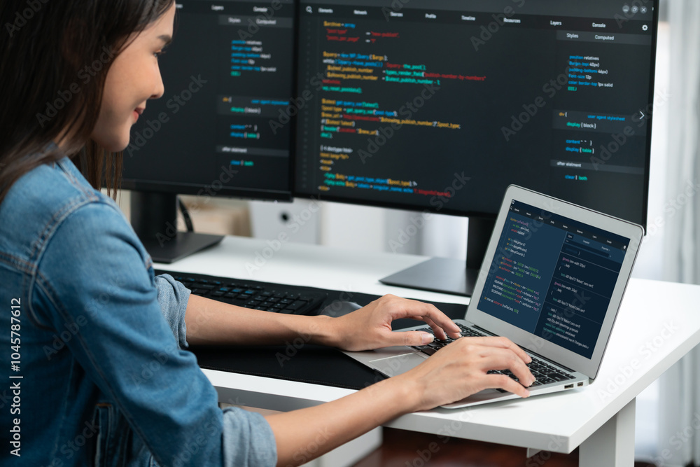 Poster smiling young asian in it developer creating with typing online information on laptop with coding pr