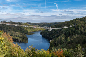 Pedestrian suspension bridge with a length of 483 m above the Rappbode dam Bode river in Harz Mountains National Park, near Thale, Germany
