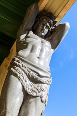 Statue of Atlant on the portico of the New Hermitage in St Petersburg, Russia