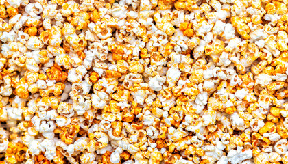 Background of lots of popcorn. Popcorn as creative texture
