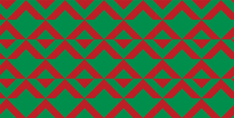 Christmas themed green and red triangle seamless geometric pattern. Perfect for printing, design and textiles