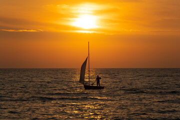 sunset-sea-boat © JacoPoland