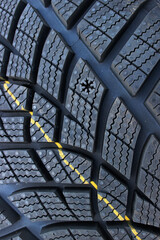 Snowflake Shaped Tyre Wear Indicator On New Winter Tyre. Tire Condition Explaining. Tire Information For Driver Safety