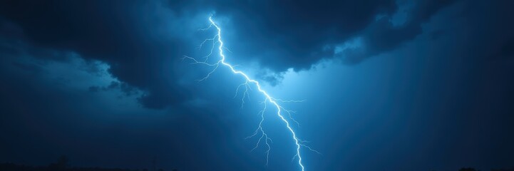 Dramatic lightning illuminates a stormy sky, capturing nature's raw power and beauty, perfect for weather-related projects or dramatic backgrounds.