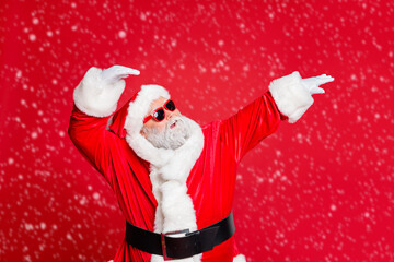Portrait of his he funky carefree fat overweight gray-haired bearded man St Saint Nicholas having fun winter December occasion corporate isolated over bright vivid shine red background