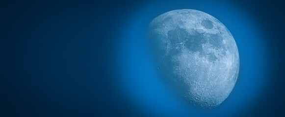Majestic moon in a clear blue sky, showcasing nature's stunning beauty