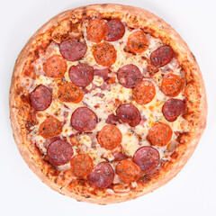 Pizza Margarita with sausage isolated on a white background. Top view