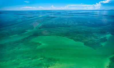 Aerial Drone Image of the entrance from Whale Harbor into Windley Harbor under the Overseas Highway in Islamorada seeing the wishbone channel for boats out into Florida bay and the Gulf of Mexico
