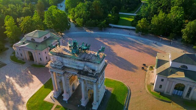Gate Sempione Porta Sempione city gate to Lombardy in the fall. Arch of Peace. Arco della pace. sunny evening in milan city park aerial panorama city triumphal arch. Sculptures. Italy Milan 11.10.2024