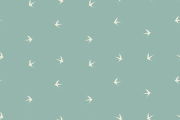 Seamless pattern with swallow silhouette on color background. Cute bird in flight. Vector illustration. Doodle style. Design for invitation, poster, card, fabric, textile