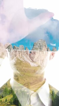 Man wearing VR glasses watch Time Lapse of Dolomites Italy, Pizes de Cir Ridge presented in double exposure effect on bright background . Virtural reality experience concept .