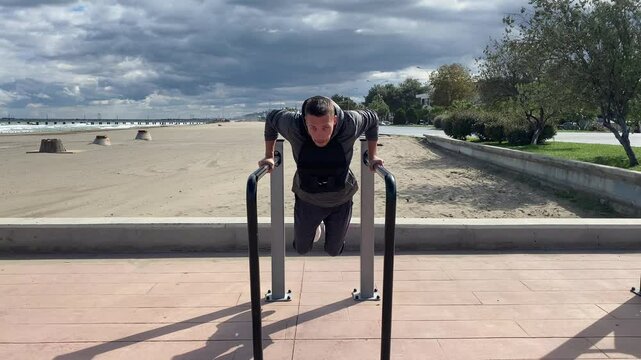 workout on parallel bars