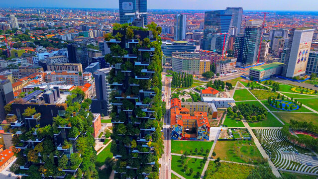 Aerial view of ecological skyscrapers with many trees on each balcony. Bosco Verticale. Modern architecture, vertical gardens, terraces with plants. Ecology. Green Planet. Milan. Italy, 22.04.2025