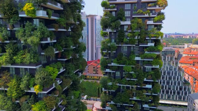 Aerial view of ecological skyscrapers with many trees on each balcony. Bosco Verticale. Modern architecture, vertical gardens, terraces with plants. Ecology. Green Planet. Milan. Italy, 22.04.2025
