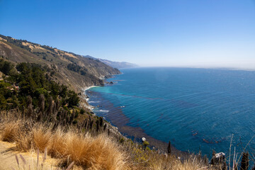 The breathtaking view of Big Sur's rugged coastline from the Grimes Point Scenic Overlook in...
